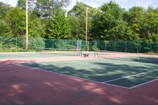double tennis courts at sunny point resort, cottages and inn, otter lake resort, dogs allowed cottages ontario resorts vacations with pet friendly accommodations